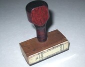 Vintage Rubber Stamp with Word Paid and Banner