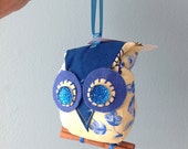 Small blue and yellow owl ornament