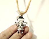 Silver Angel Necklace with Glass Face on Yellow Orange Silk Cord