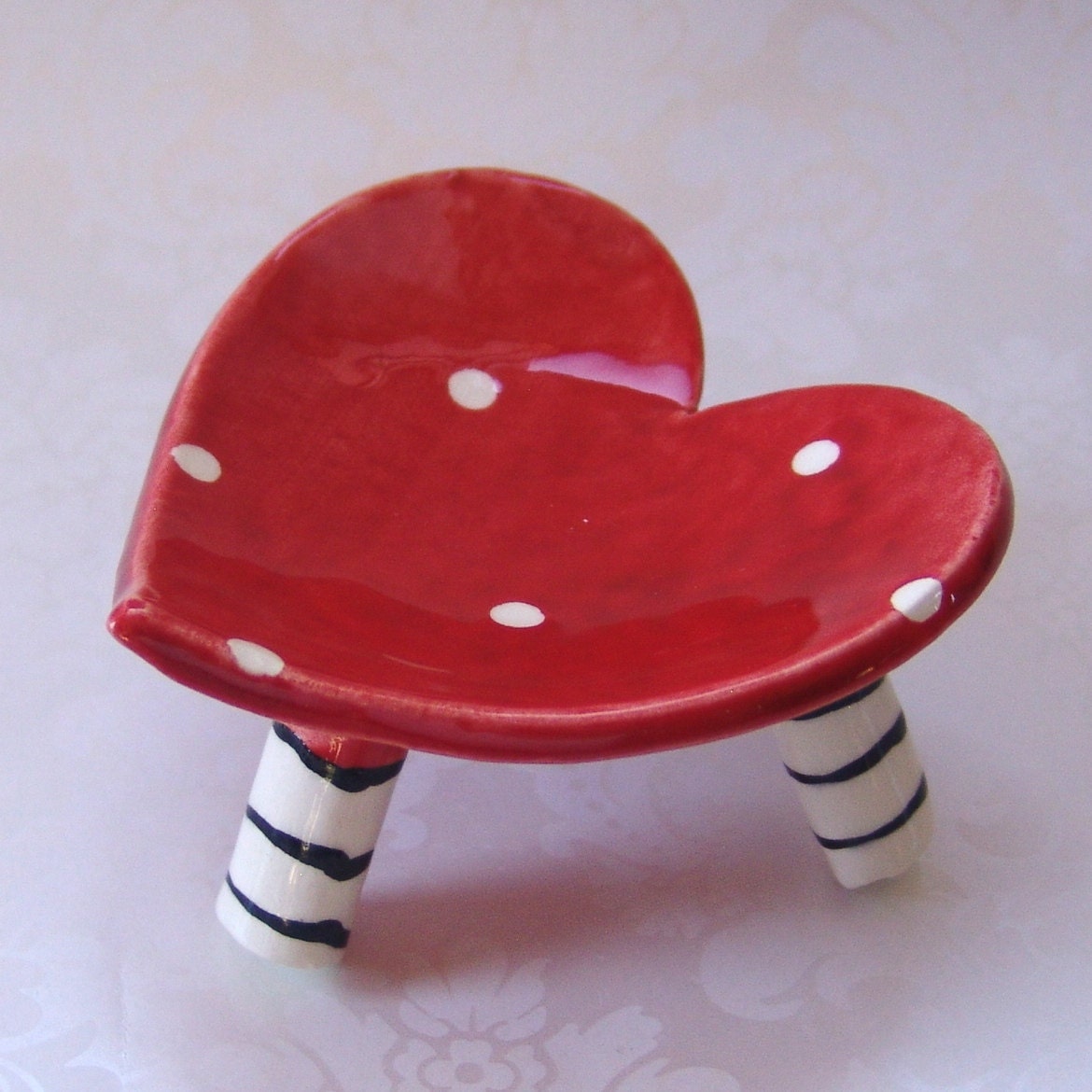 ceramic heart dish,  red polka-dots with striped legs