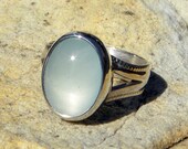 Sterling silver ring with pale blue milky aquamarine cabochon