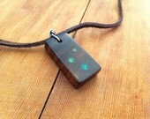 Modern Minimalist Bolivian Rosewood Exotic Hardwood Pendant with emerald green circles