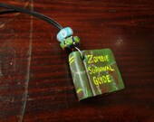 Zombie Survival Guide pendant book