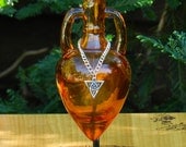 CELTIC WITCH Ancient Magic Potion Bottle Vessel with Metal Stand - Burnished Amber with Silver Triquetra Charm . Pagan Wicca WItchcraft