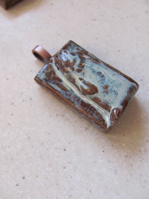 Fish-head pendant - clay pendant - hand made pottery pendant