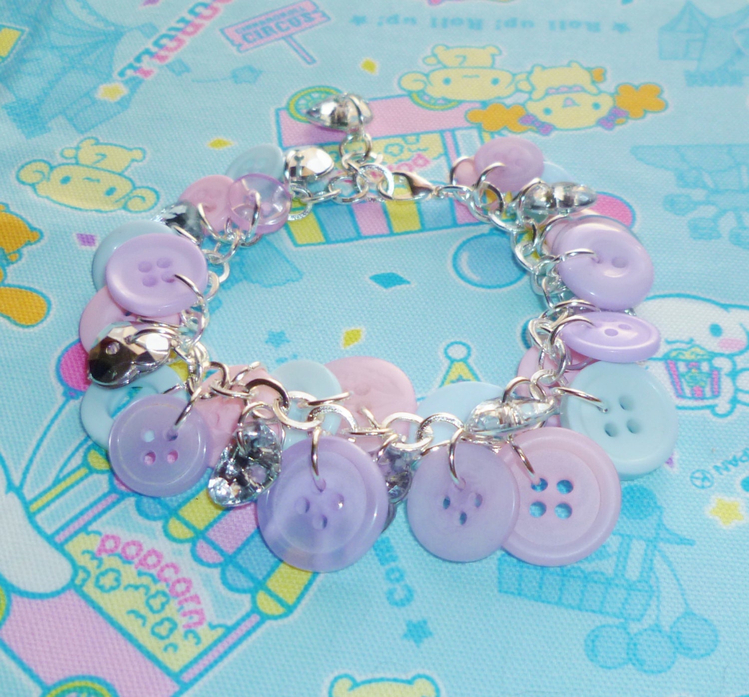 Pastel Fairy Sparkle - Lilac, pink, blue and silver plated button charm bracelet