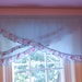 Ruffled, floral  nursery curtain