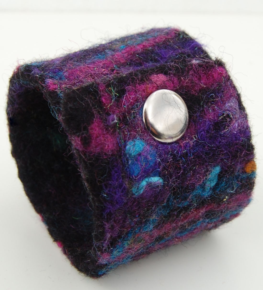Fiesta Cuff - A handfelted cuff in Black Merino Wool with fun and sparkles.
