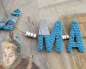 Vintage beaded letters FLORIST turquoise /timeworn
