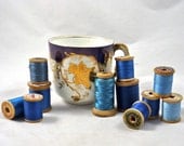 Victorian China Mug in White with Royal Blue and Gold Details Filled with Vintage Spools of Silk Thread in Shades of Blue