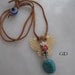Handmade modern- romantic necklace/gold plated/butterfly/turquoise/leather -suede cord/evil eye