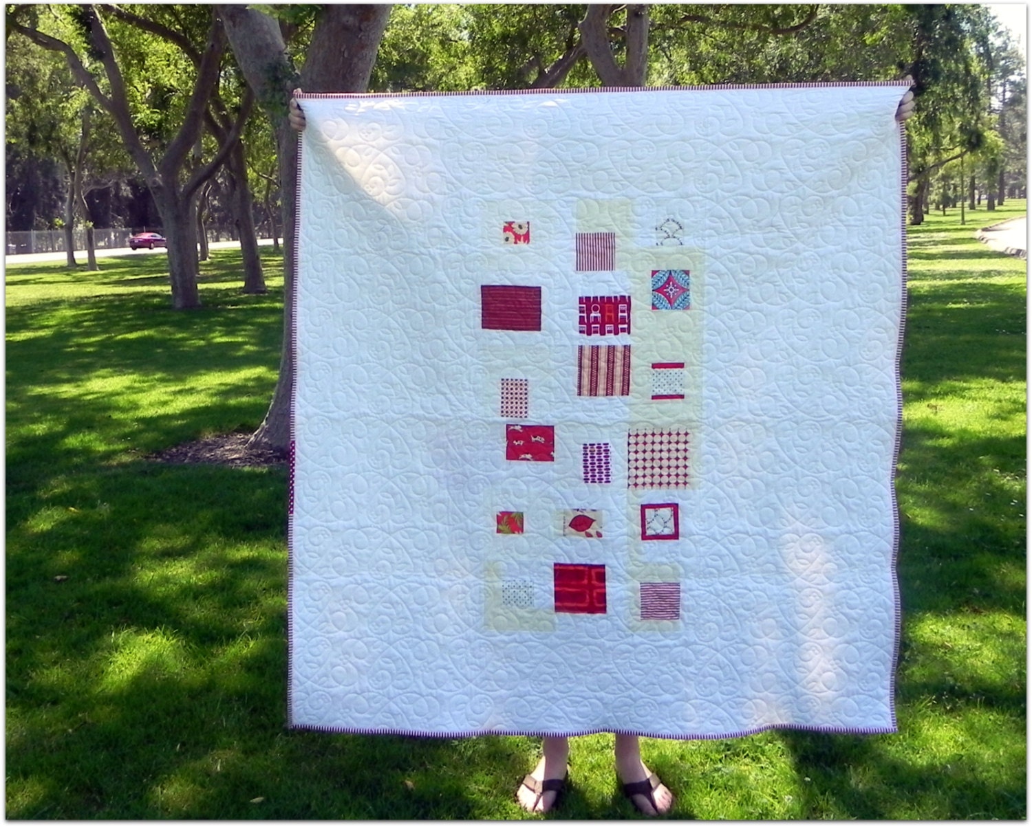 Simple Mostly White and Red Quilt