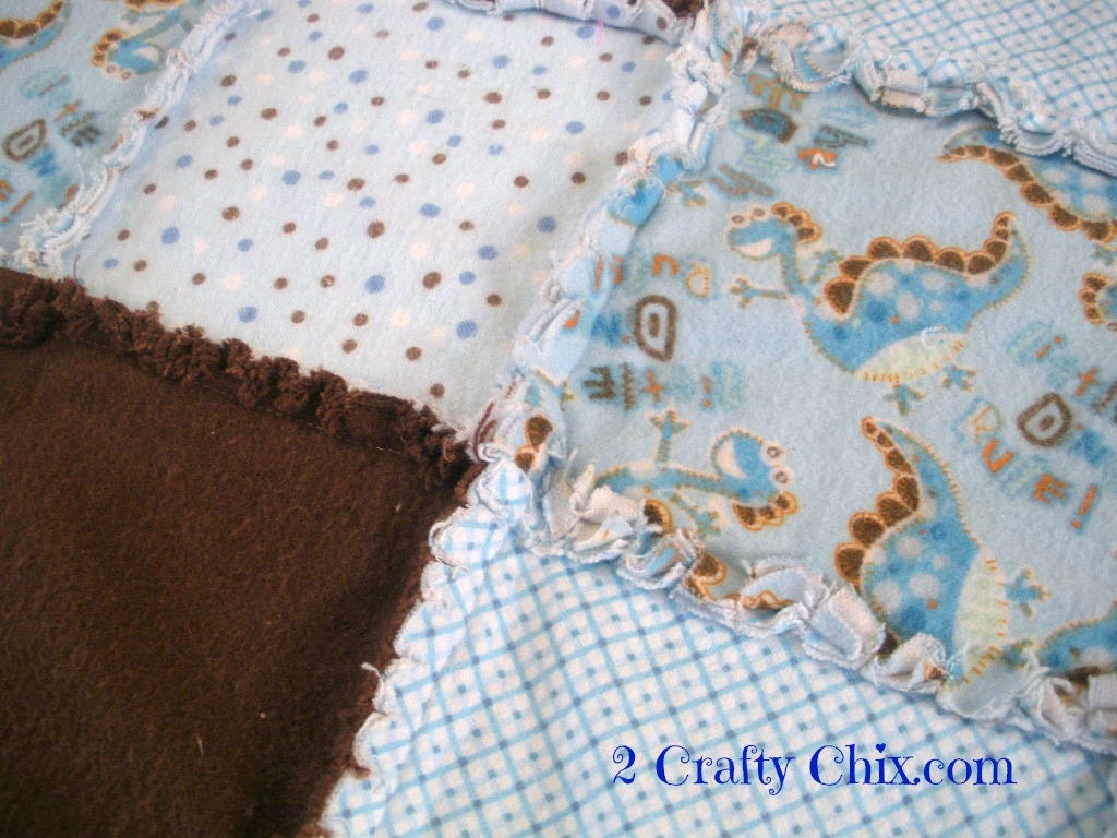 Dinosaurs in Blue and Brown Flannel Rag Edge Quilt Blanket