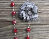 Grey Flower with Red Crystals Necklace.