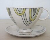 Dainty Teacup and Saucer with Blue, Green and Gray Drips