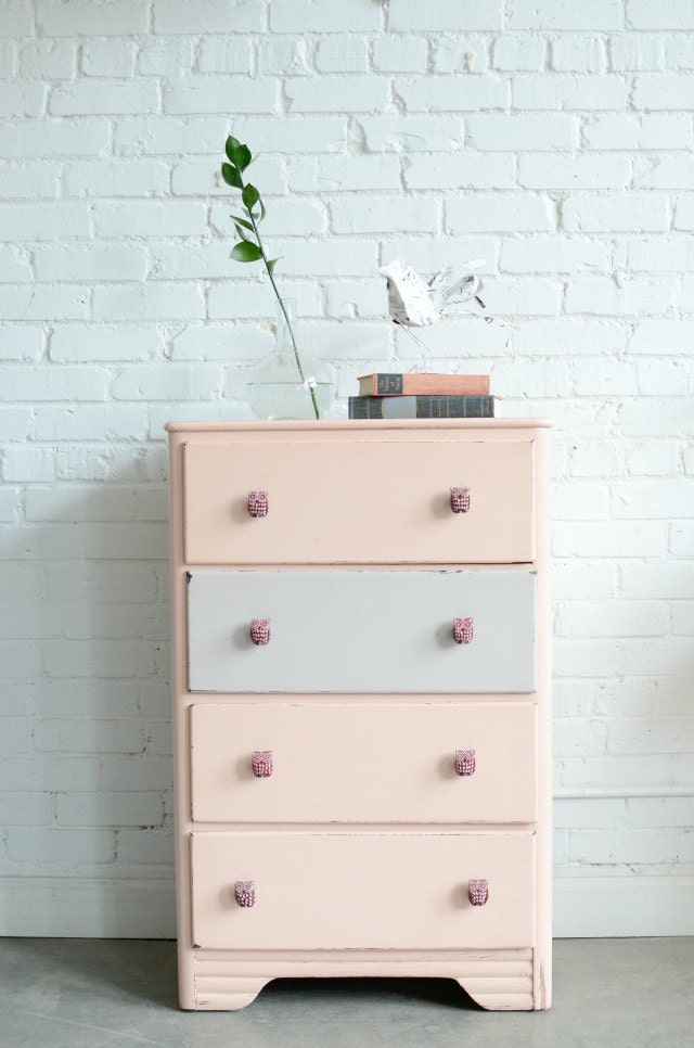 Peach and gray chest with owl knobs named Liesbeth