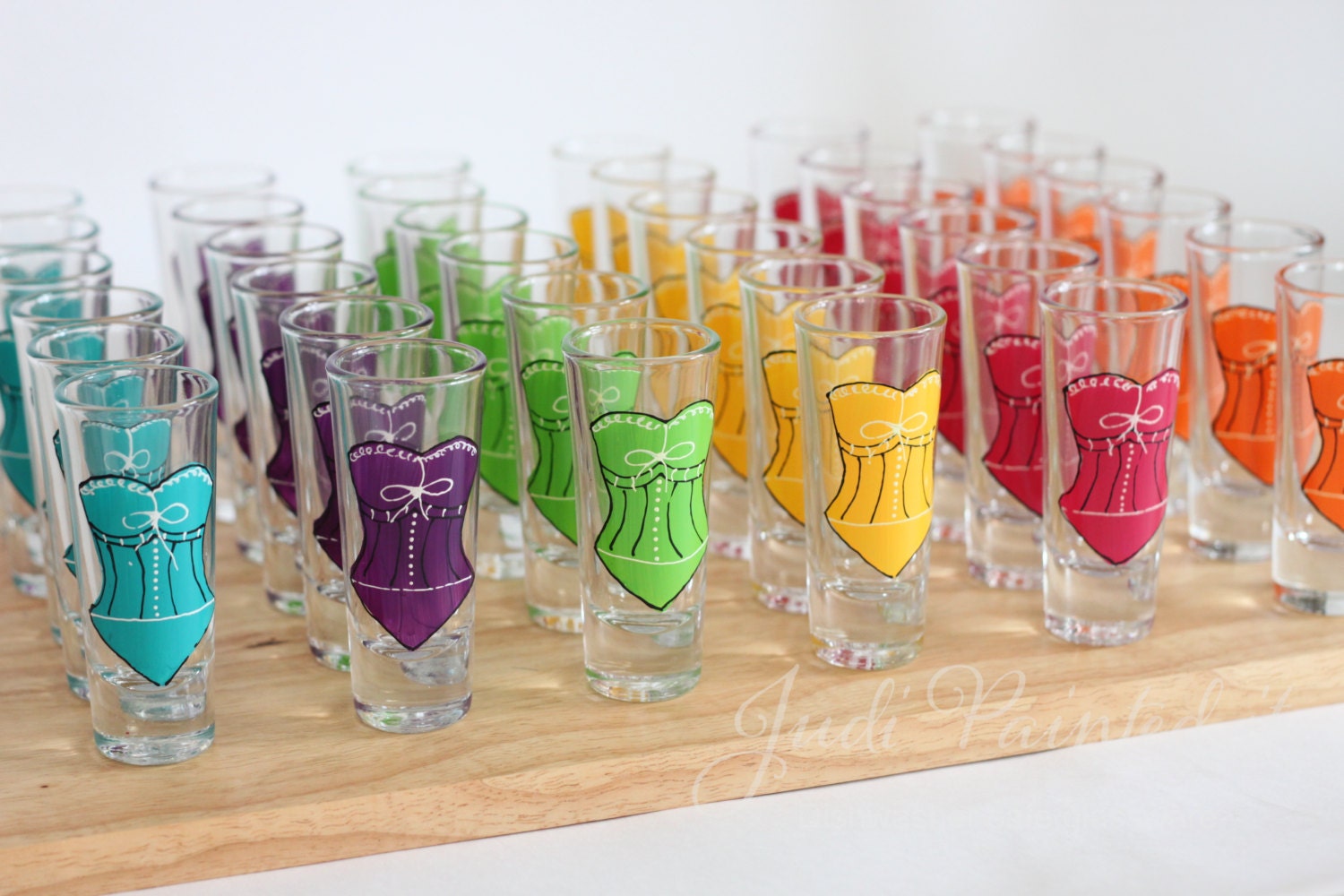 Bridesmaid shot glasses in an assortment of corset colors to choose.  FREE personalization and dishwasher safe