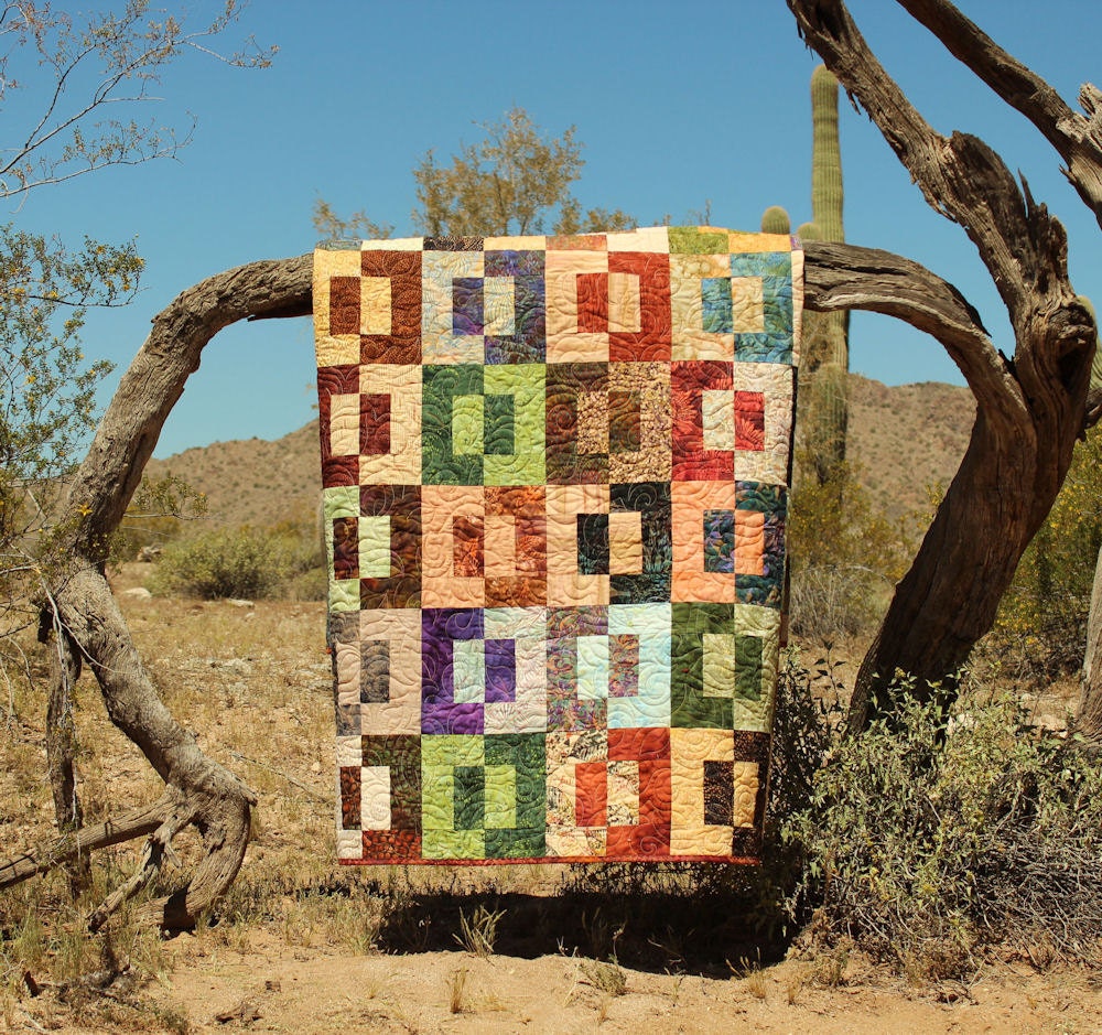 Handmade Patchwork Scrap Lap Quilt in Rust, Green and Brown Batiks - Split Decision