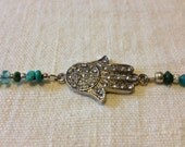 Hamas crystal encrusted turquoise bracelet  