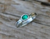 emerald solitaire engagement ring . ethical chatham gemstone engagement ring . rustic vine alternative engagement ring