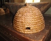 Primitive Bee Skep handmade with jute.  Dipped in pure beeswax and rubbed with spices.  Perfect for Honey or Hive themed showers