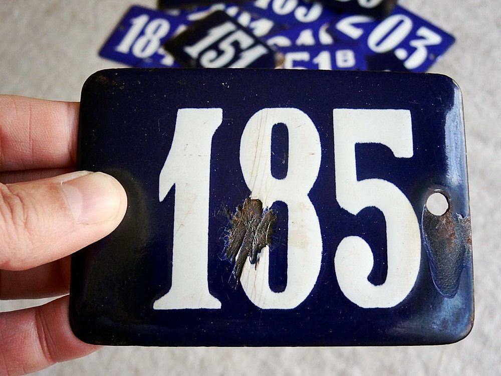 vintage enamel house number 185, white number on navy, from the Netherlands