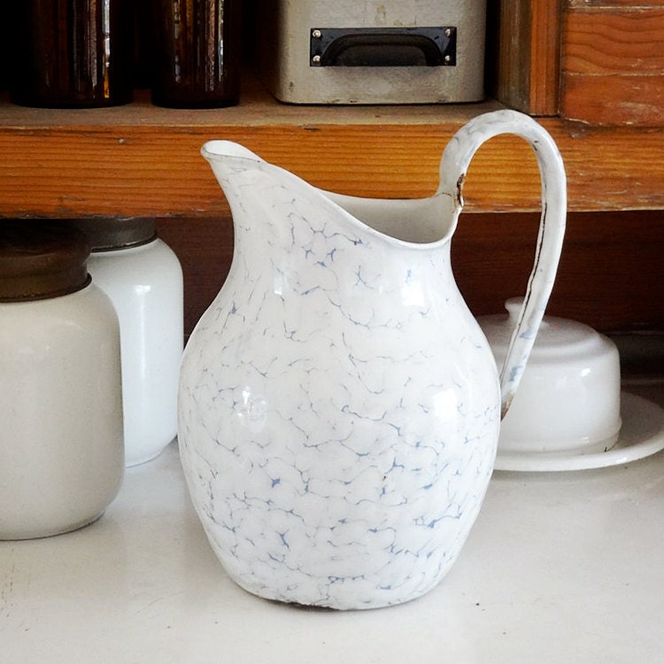 vintage French enamelware pitcher, white with blue chickenwire pattern, classic curved shape