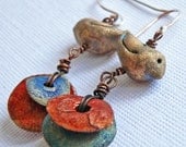 Beautiful earrings...birds... copper and brass beads... May 54