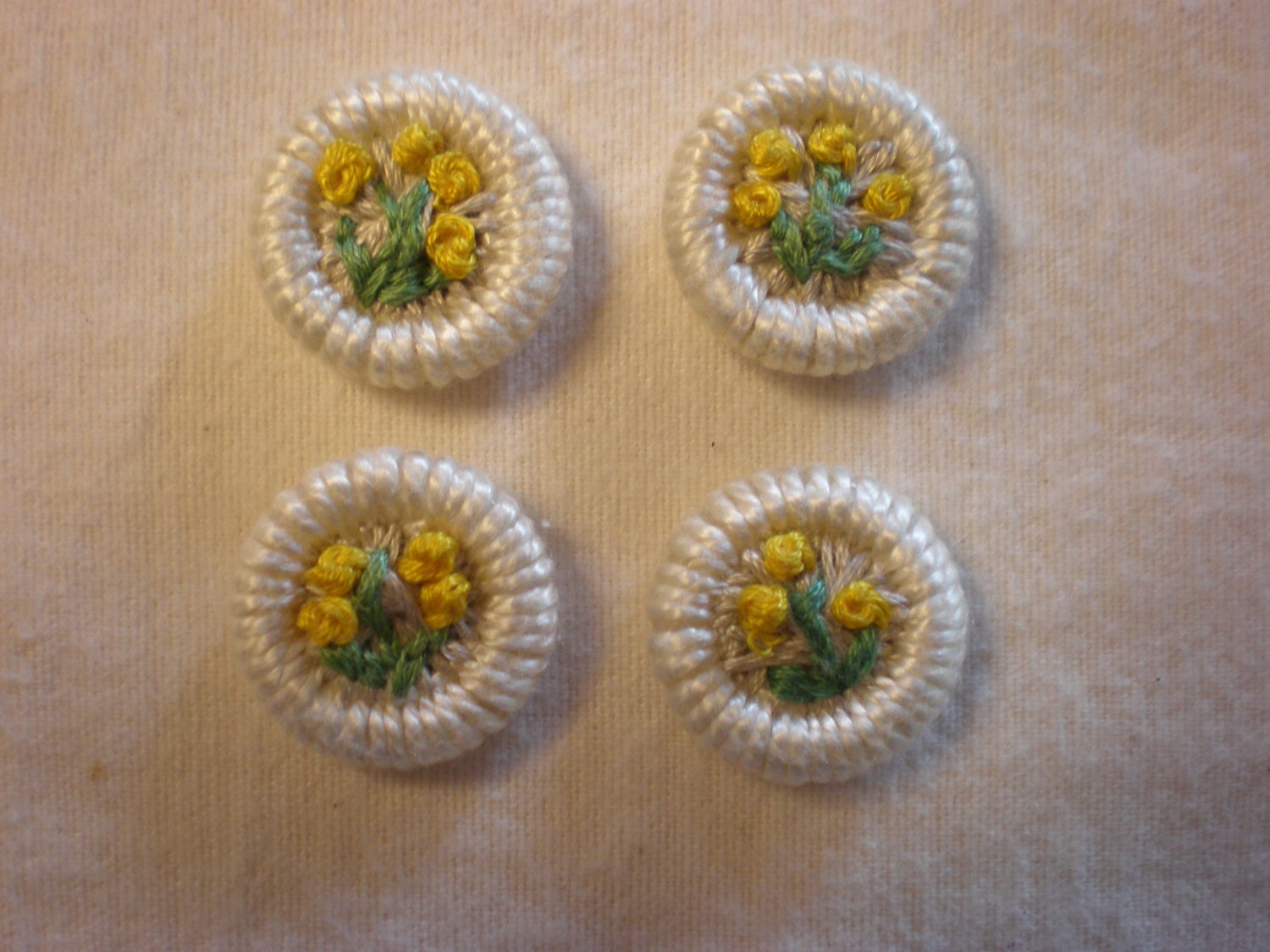 Hand embroidered Dorset Buttons