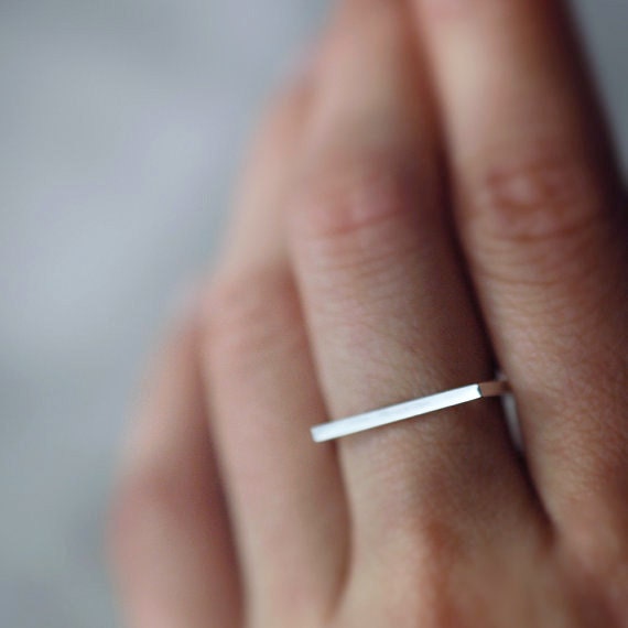 Finer Silvery Adam Smile ring