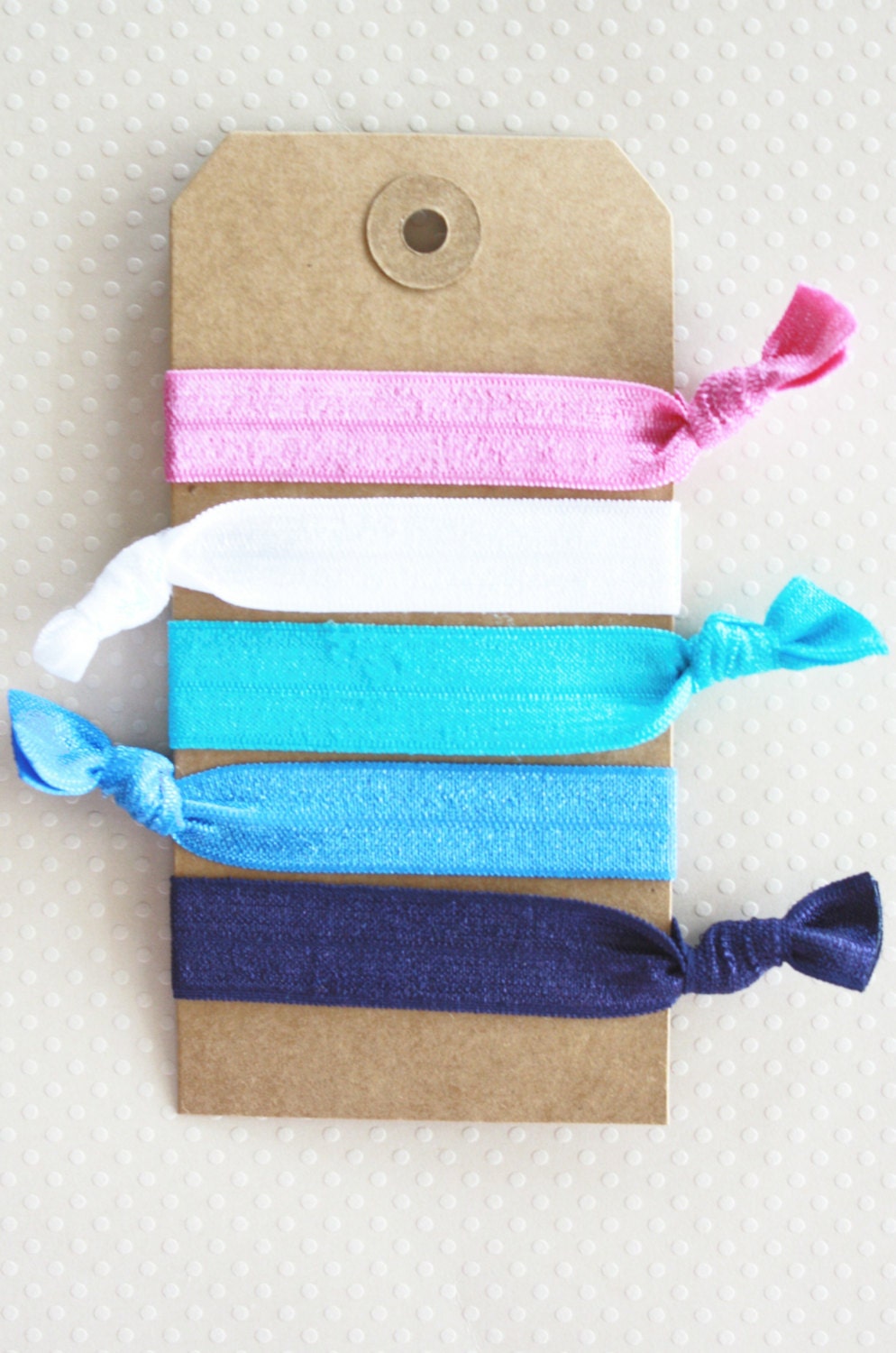 elastic hair ties... plum, simply white, teal, ocean blue, navy blue