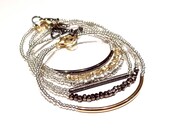 metalic heartlines in all silver // dainty bracelet with mini geometric nugget silver beads and shiny silver seed beads