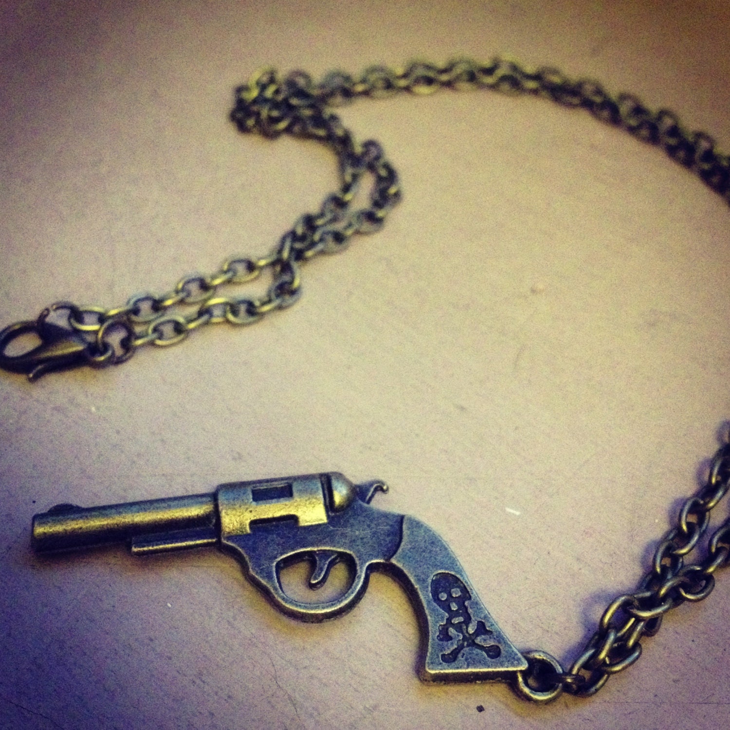 Gun 'Put 'em up' necklace