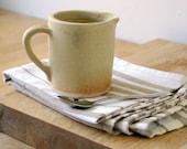 SECONDS SALE - small milk jug - hand thrown in stoneware and glazed oatmeal