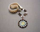 Dreamscape - a crochet dreamcatcher necklace with lace raw quartz & smokey quartz
