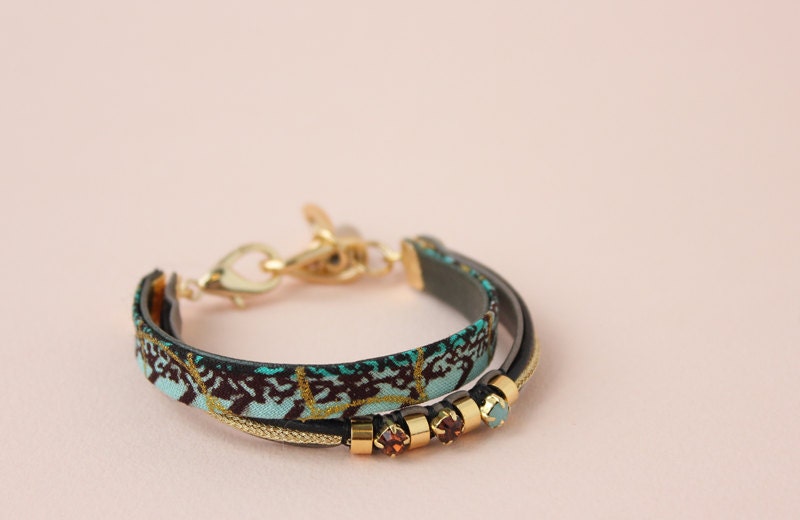 Ooty bracelet - African Cotton, swarovski and leather bracelet with gold, black and green