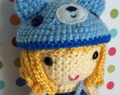 Claire blonde doll with blue bear hat