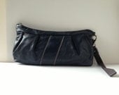 ultra supple remnant leather pleated clutch in midnight blue  // la pochette