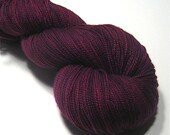 Sock yarn fingering weight hand dyed superwash merino/nylon, Deep Raspberry