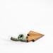 Wooden Paper Plane Brooch with turquoise stitching