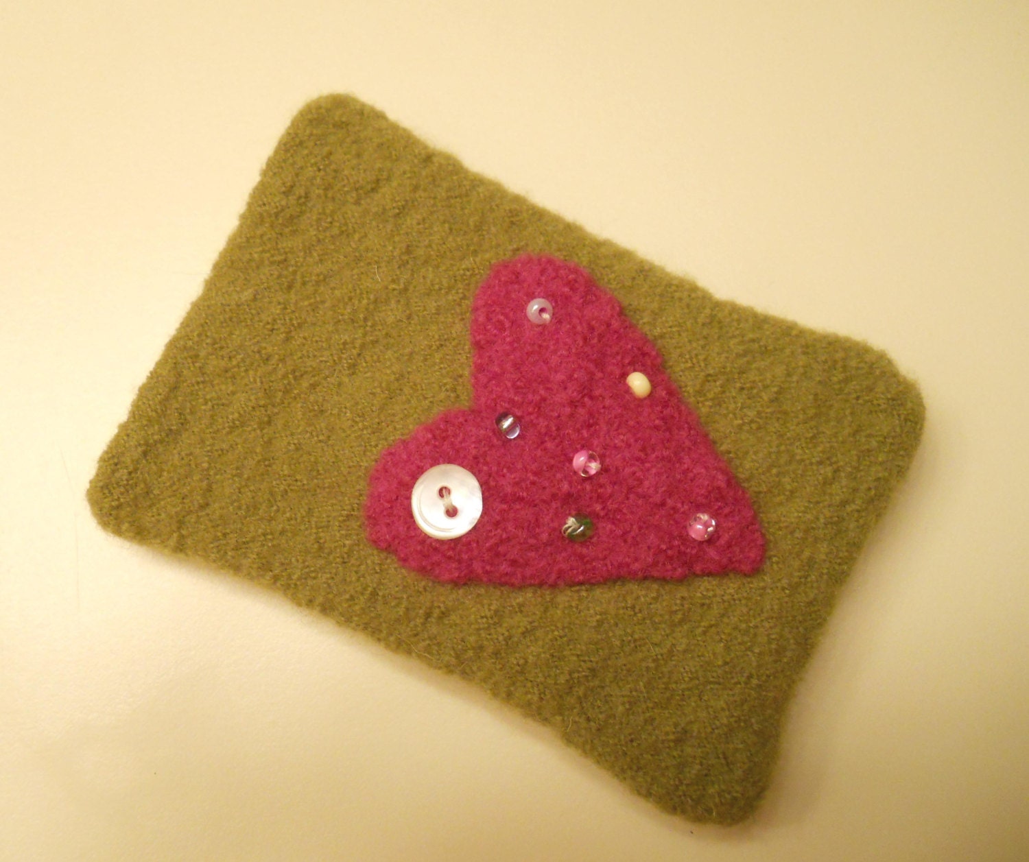 Little Lined Case: made from recycled wool and cashmere. Felted wool hot pink heart, button & beads, fabric lined.