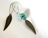 asymmetrical tribal earrings - antique bronze leaves and turquoise howlite