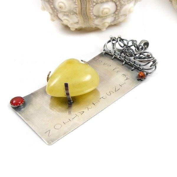 Silver pendant with amber heart and inscription , wire wrapped , metalwork