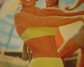 1966 Coppertone Pinup Advertisement Featuring Cyd Charisse