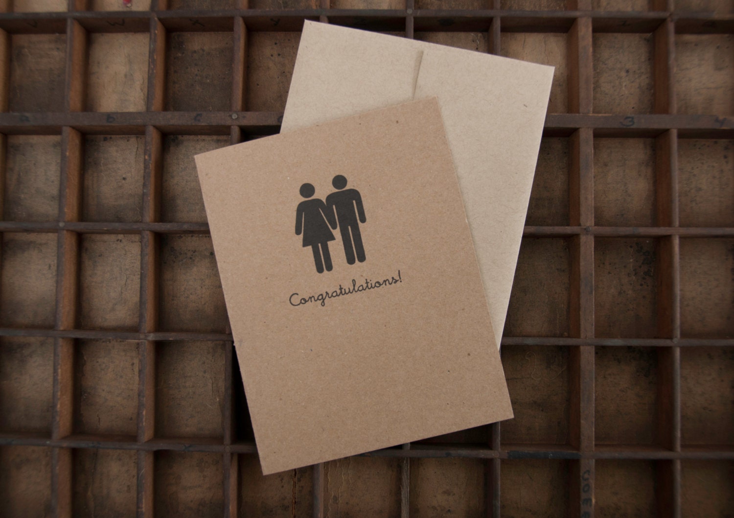 Letterpress wedding congratulations card with pictogram figures