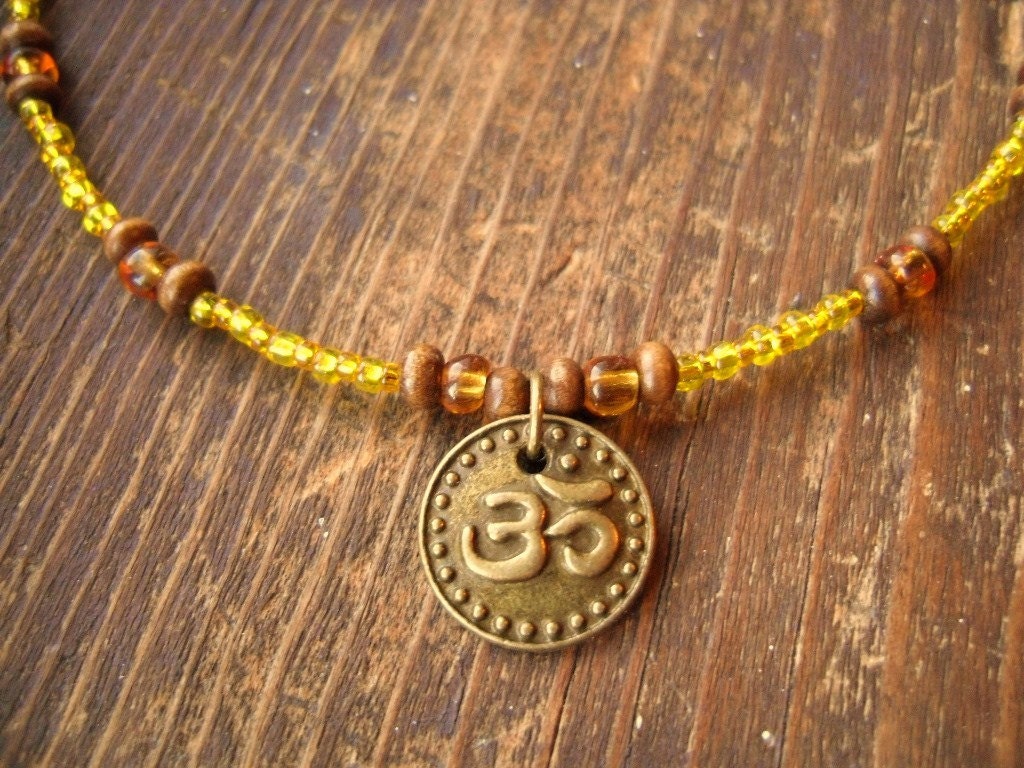 Om/Buddhism/Hinduism/Yoga/MeditationDharma Charm Necklace by TheReflectivePause.etsy.com