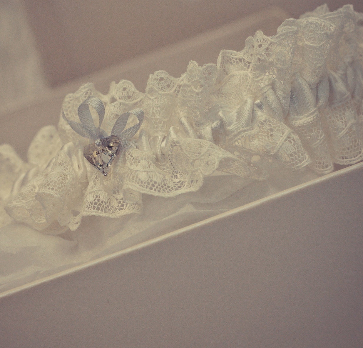 Bridal garter, ivory silk and Nottingham lace with tiny softest blue bow and vintage style Swarovski crystal heart