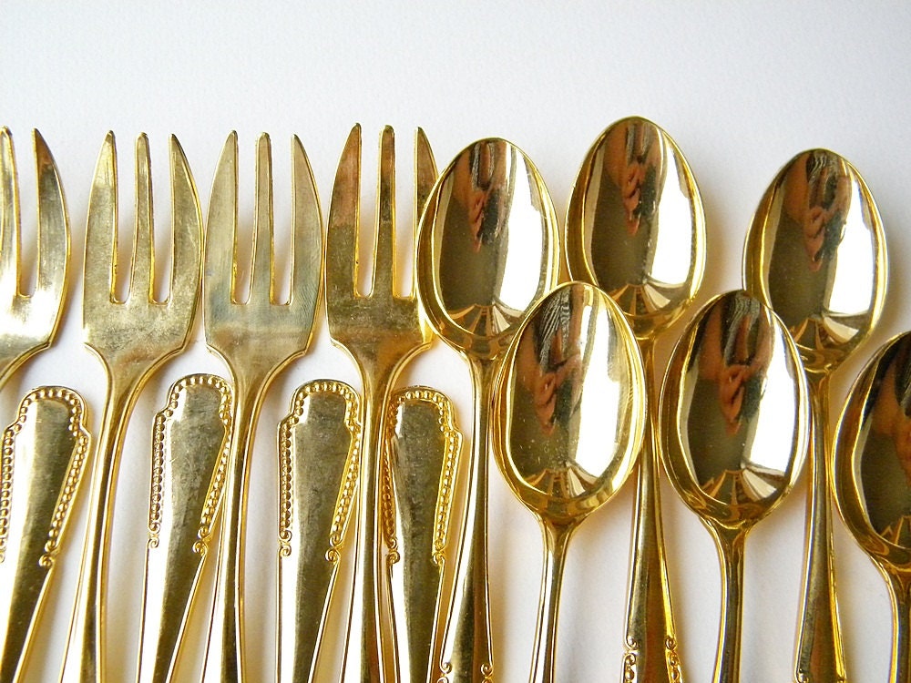 vintage gold teaspoons and fork collection