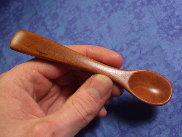 Hand carved  baby spoon in rich cherry wood