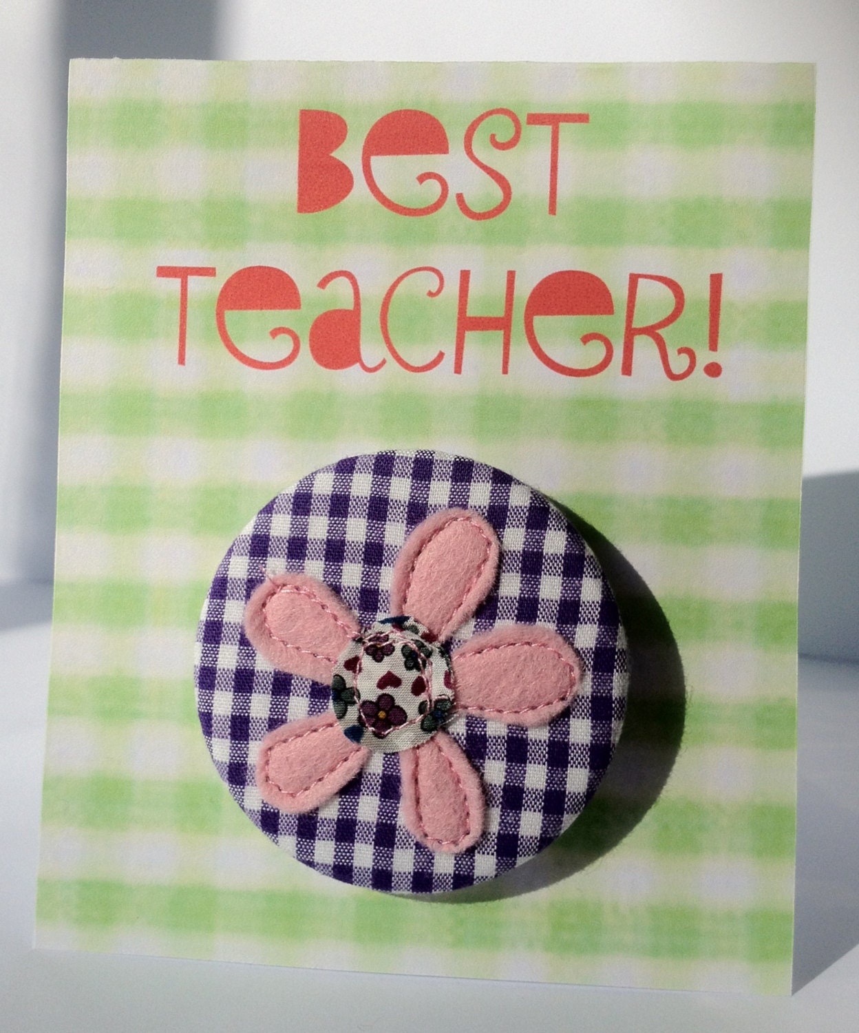 Pretty purple gingham applique flower button badge on BEST TEACHER gift card